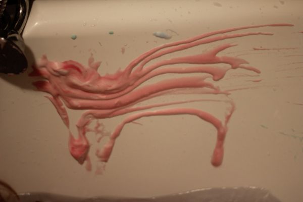 Add food coloring to shaving cream