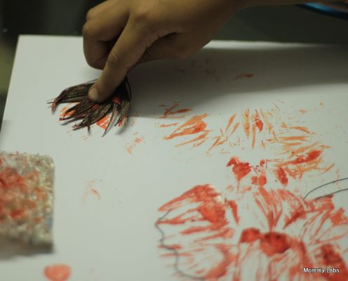 Here are the steps to do feather stamping with kids